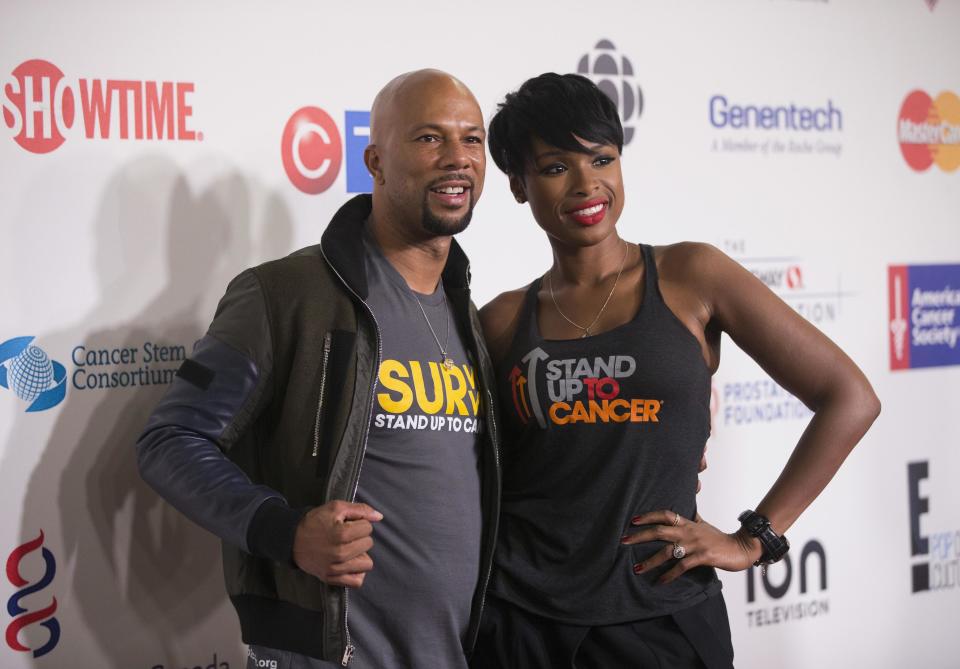 Recording artists Common and Jennifer Hudson pose as they arrive for the fourth biennial Stand Up To Cancer fundraising telecast in Hollywood, California September 5, 2014. REUTERS/Mario Anzuoni (UNITED STATES - Tags: ENTERTAINMENT)
