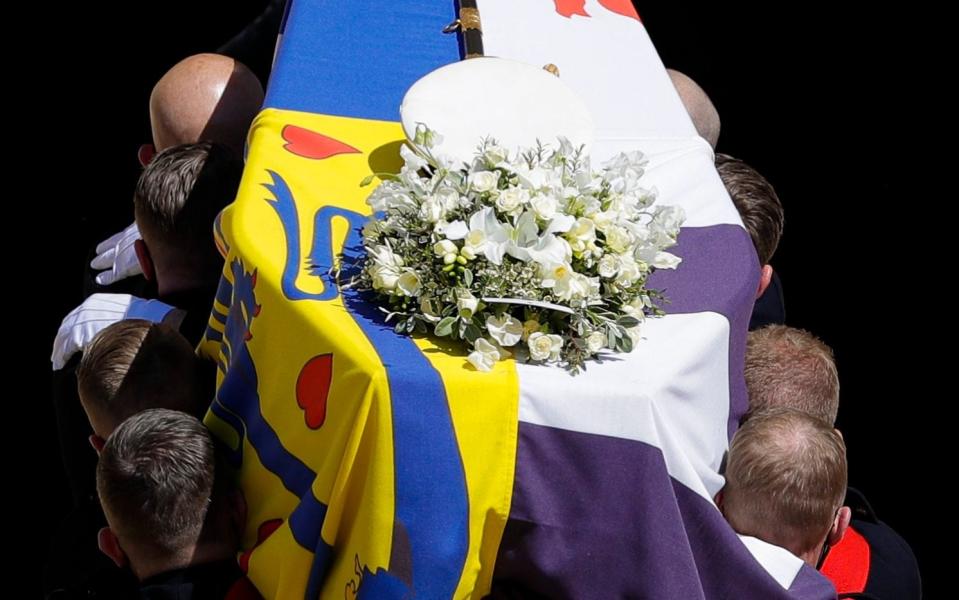 The coffin as it was carried inside St. George's Chapel - Kirsty Wigglesworth/Pool via AP