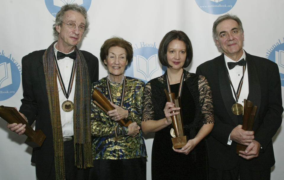 FILE - In this Nov. 19, 2003 file photo, the 2003 National Book Awards recipients from left to right, C.K. Williams for Poetry, Shirley Hazzard for Fiction, Polly Horvath for Young People's Literature, Carlos Eire for Nonfiction, in New York City. The award-winning novelist Hazzard has died at her home in New York City at age 85. Hazzard's friend Frances Alston says the author died Monday, Dec. 12, 2016. She had been in failing health. (AP Photo/Stuart Ramson, File)