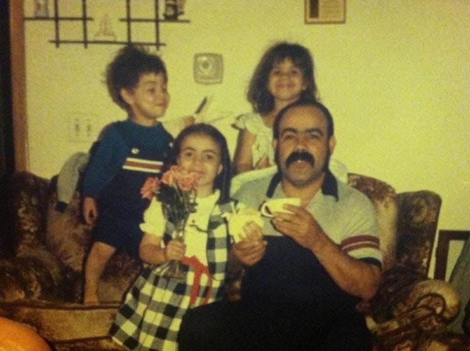 Emilio Quintana with three of his eight children. Quintana was a bodega owner who was killed in a robbery attempt May 15, 1991.