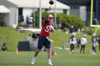 New England Patriots quarterback Mac Jones passes the ball during an NFL football practice, Thursday, July 29, 2021, in Foxborough, Mass. (AP Photo/Steven Senne)