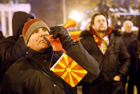 Supporters of the movement boycotting the deal with neighboring Greece to change the country's name to the Republic of North Macedonia protest in front of the parliament building during parliamentary debates on constitutional amendments related to the name change, in Skopje, Macedonia January 11, 2019. REUTERS/Ognen Teofilovski