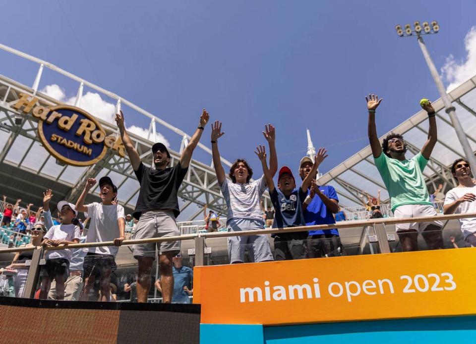 Fans cheer for Taylor Fritz of the United States after he defeated Holger Rune of Denmark during their match at the Miami Open tennis tournament on Tuesday, March 28, 2023, in Miami Gardens, Fla.