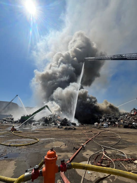 LIVE: Firefighters battle large blaze at Portland metal recycling facility