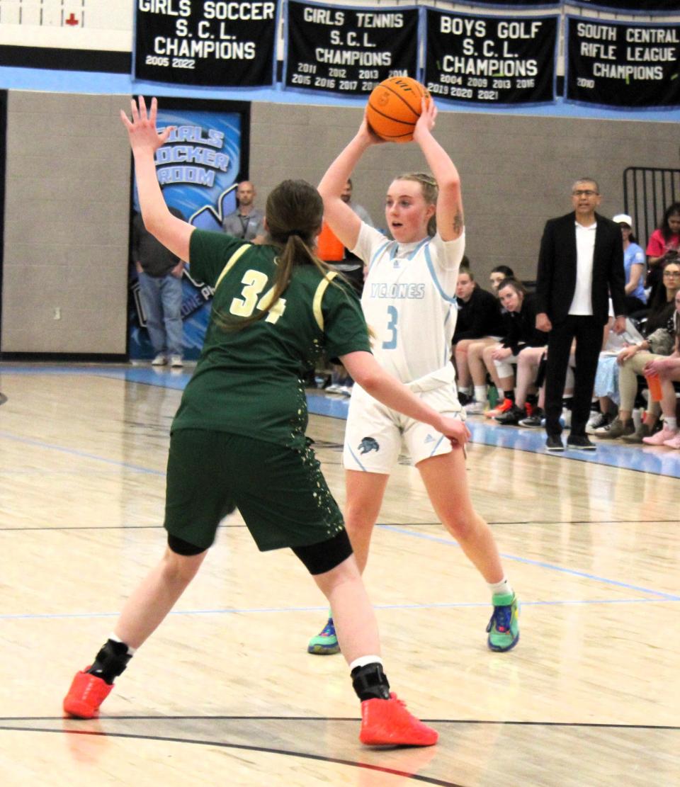 Pueblo West's Makenna McGraw surveys the court for a pass against Bear Creek during a matchup in the Class 5A girls basketball playoffs first round at Pueblo West on Tuesday, February 20, 2024.