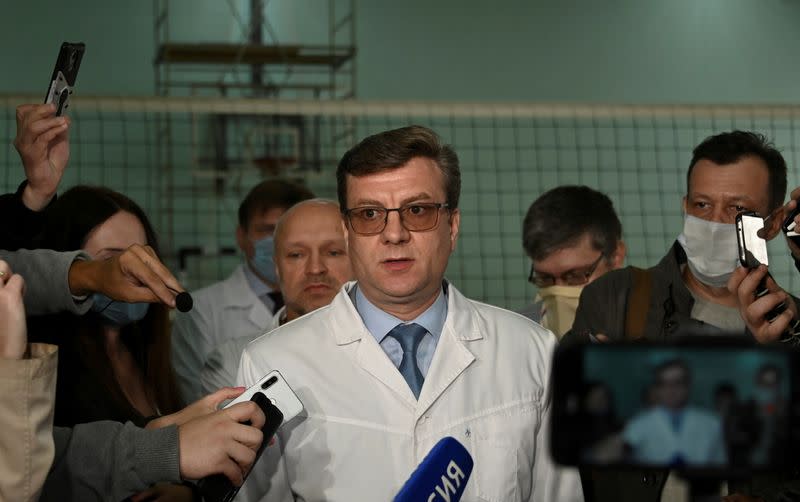 FILE PHOTO: Alexander Murakhovsky, chief doctor of a hospital, where Alexei receives medical treatment, speaks with the media in Omsk