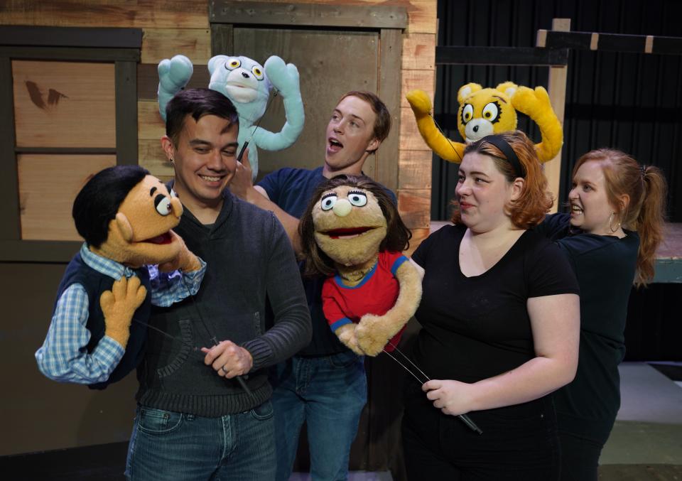 ACTORS performers pose on stage for a photo as they prepare for their production of "Avenue Q." Pictured are Jordan Miyoshi as Princeton, Gus Pope as a Bad Idea Bear, Tatum Murphy as Kate Monster and Samantha Martin as a Bad Idea Bear.