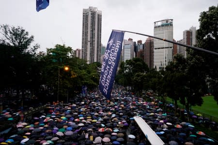 Anti-extradition bill protesters march to demand democracy and political reforms, in Hong Kong