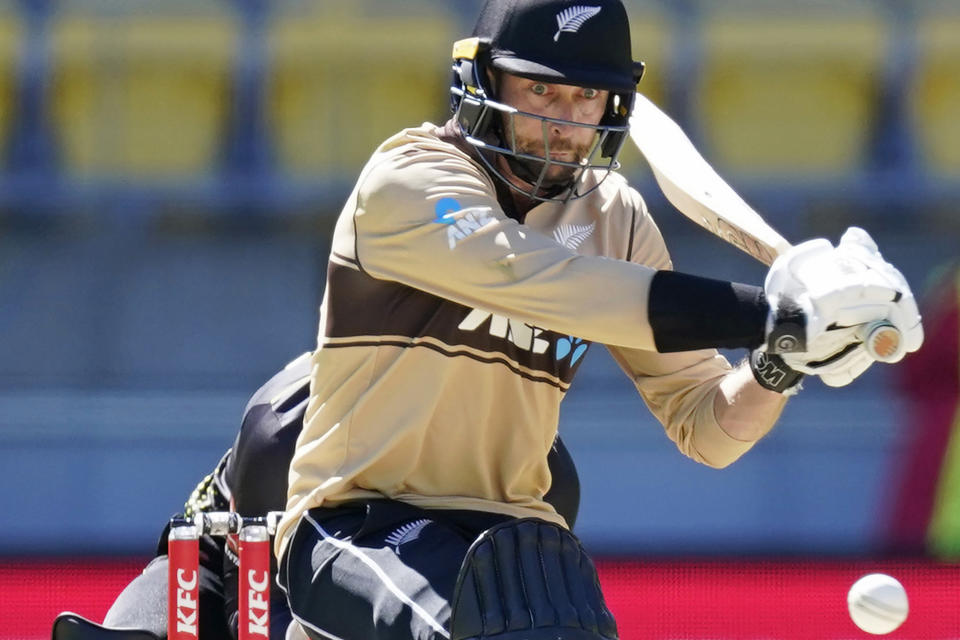 FILE - In this March 7 , 2021, file photo, New Zealand's Devon Conway bats against Australia during their 5th T20 cricket international match at Wellington Regional Stadium in Wellington, New Zealand. Africa-born batsman Conway has been named among three uncapped players in the New Zealand cricket team which will play two tests in England in June. (John Cowpland/Photosport via AP, File)