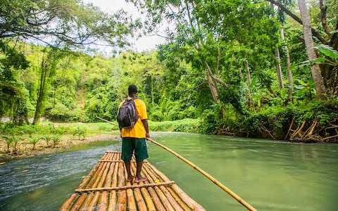 Bamboo Rafting on the Martha Brae River in Jamaica - Credit: iStock