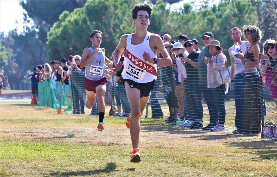 Oakdale High’s Jackson Oliveira took first in the small school varsity boys race at the 20th Golden Eagle Invitational at Woodward Park in Fresno. His time was 15:42.94.
