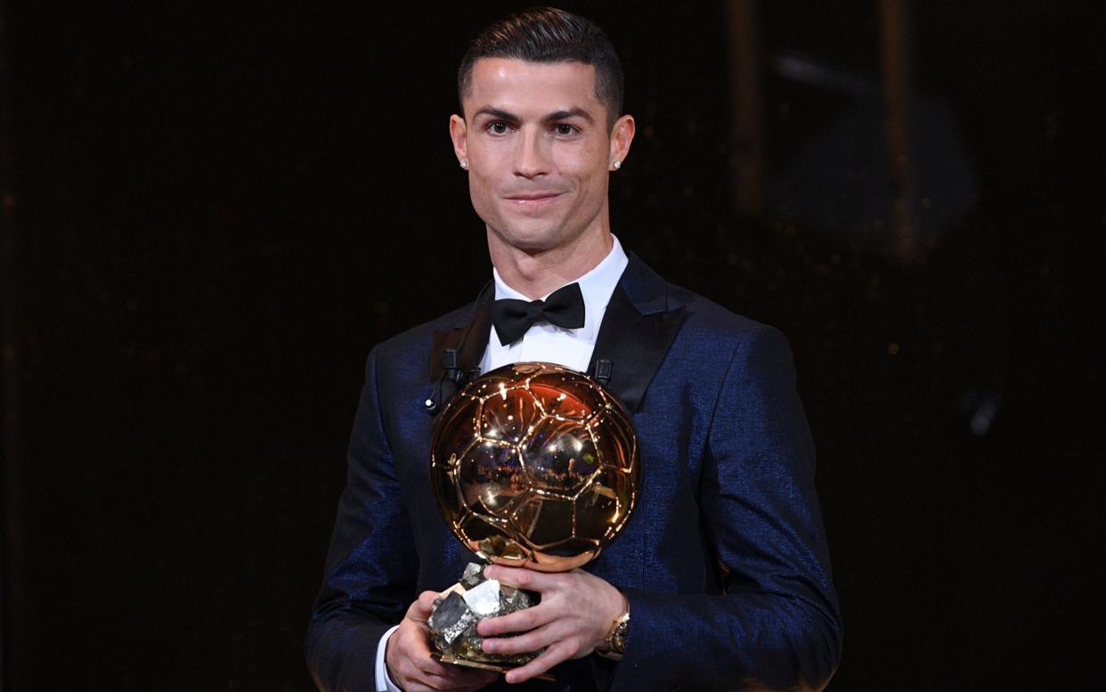 Cristiano Ronaldo accepted his fifth world player of the year trophy halfway up the Eiffel Tower. (The Telegraph)