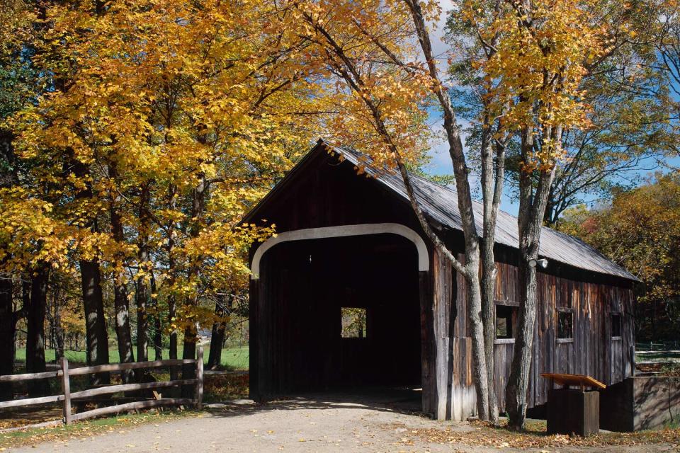 Car at opening of covered bridge,Grafton, Vermont