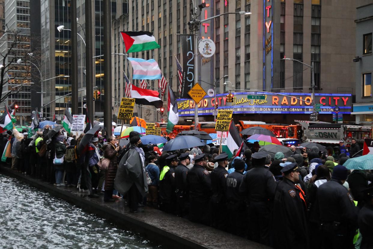 Pro-Palestinian demonstrators gather for the "Flood Manhattan for Gaza" rally outside Radio City Music Hall where US President Joe Biden is attending a fundraiser for his re-election campaign, in New York, March 28, 2024. (Photo by Leonardo Munoz / AFP) (Photo by LEONARDO MUNOZ/AFP via Getty Images) ORG XMIT: 776126247 ORIG FILE ID: 2113294476