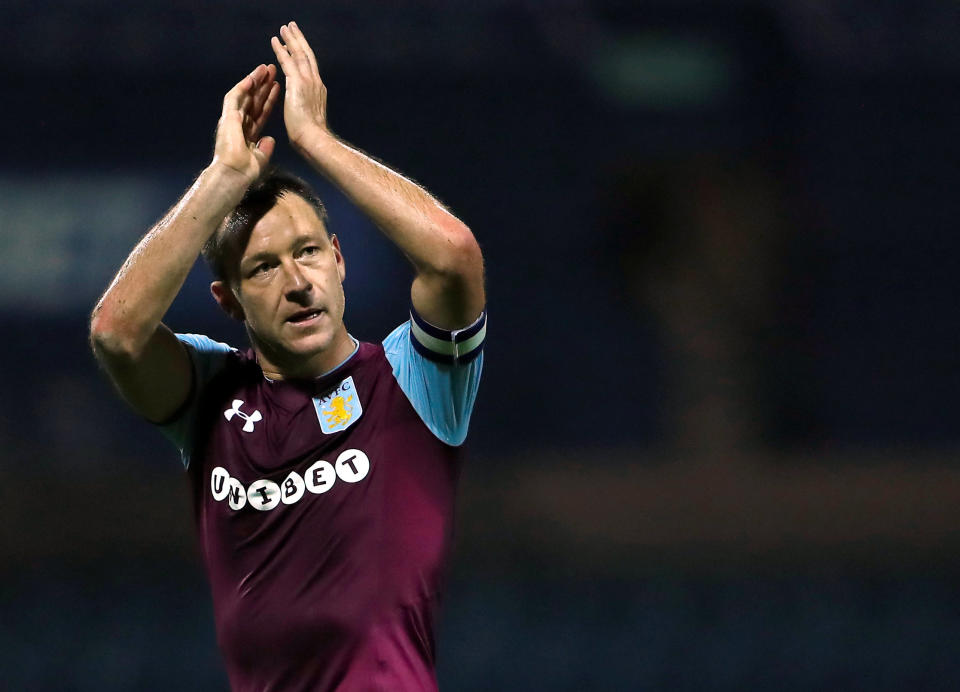 John Terry applauds Villa fans after the win at Preston