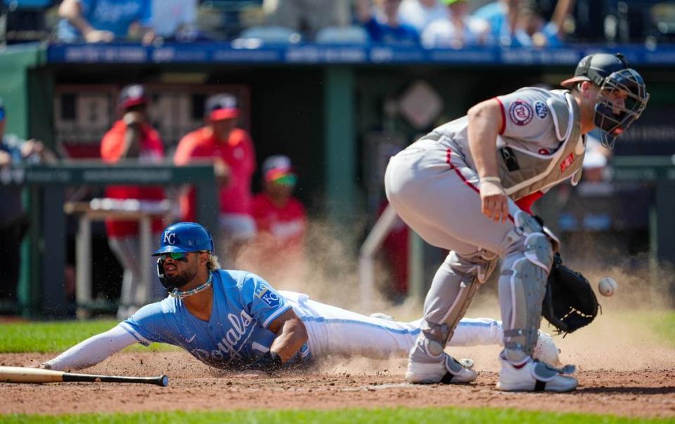 Royals right fielder MJ Melendez slides safely into home as the winning run against the Washington Nationals on Sunday at Kauffman Stadium.