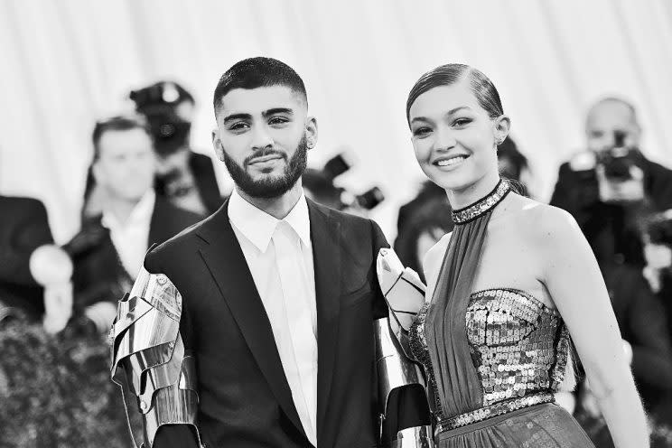 The rumor mill went into overdrive when Gigi Hadid stepped out wearing a gold band on her ring finger. Did boyfriend Zayn Malik propose? (Photo: Getty Images)