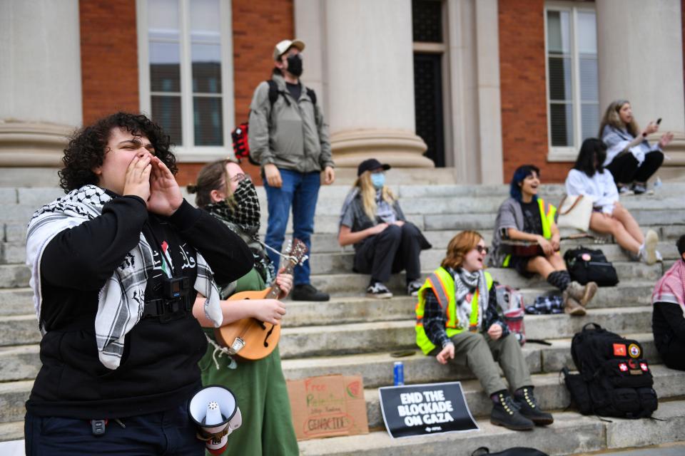 Palestinian supporters chant outside of Sikes Hall during a peaceful protest at Clemson University on Saturday, May 4, 2024.
