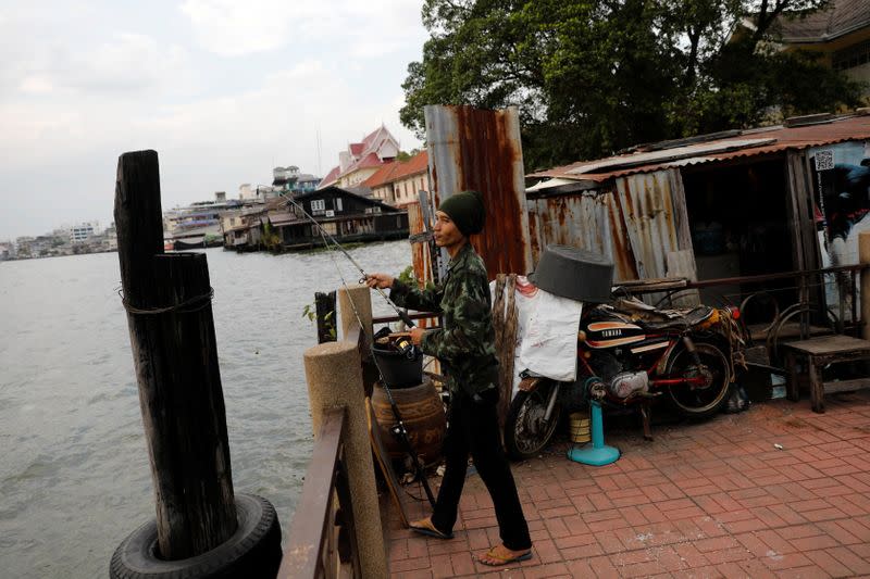 The Wider Image: In old Bangkok, a goddess resists a wave of gentrification