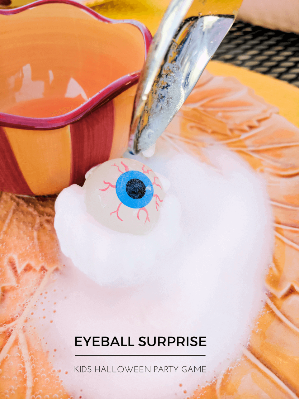 <p>If there's anything better than a fun Halloween game, it's one that doubles as a <a href="https://www.goodhousekeeping.com/life/parenting/g32176446/science-experiments-for-kids/" rel="nofollow noopener" target="_blank" data-ylk="slk:cool science experiment;elm:context_link;itc:0;sec:content-canvas" class="link ">cool science experiment</a>! This one calls for kids spooning vinegar on top of a bouncy ball frozen in baking soda and water — then watching it reveal a spooky eyeball surprise.</p><p><em><a href="https://www.merrimentdesign.com/fun-kids-halloween-party-game-eyeball-surprise.php" rel="nofollow noopener" target="_blank" data-ylk="slk:Get the tutorial at Merriment Design »;elm:context_link;itc:0;sec:content-canvas" class="link ">Get the tutorial at Merriment Design »</a></em></p>