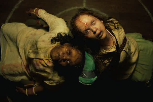 <p>Universal Pictures</p> (Left to right:) Lidya Jewett and Olivia O'Neill in "The Exorcist: Believer"