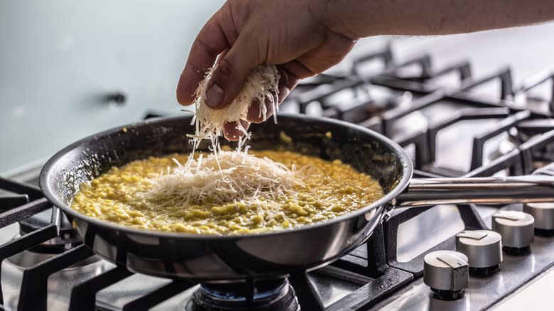 Fresh Parmesan sprinkled on risotto