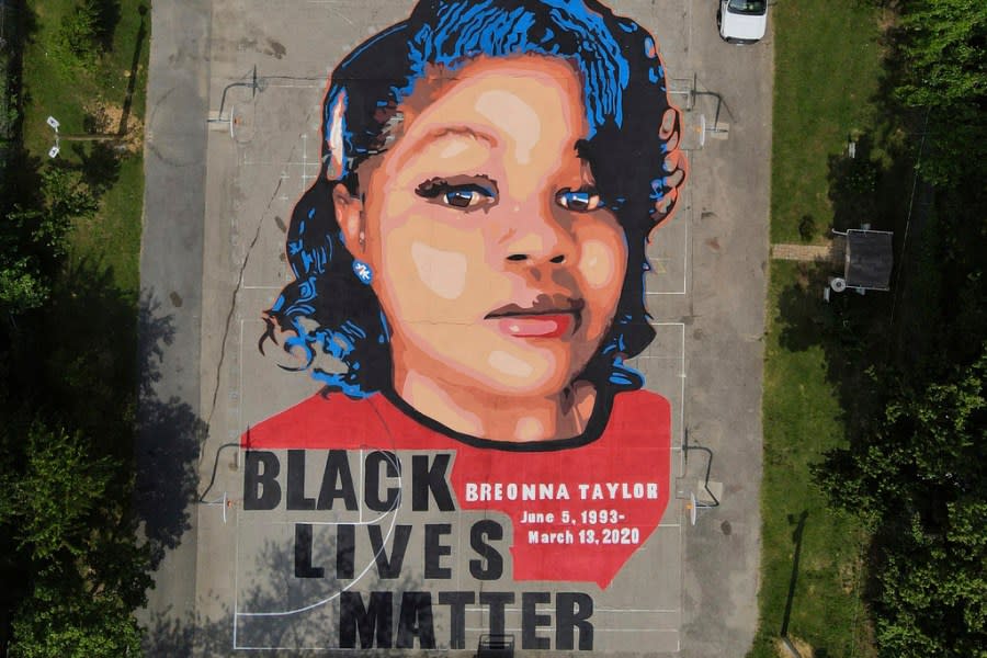 FILE – A ground mural depicting a portrait of Breonna Taylor is seen at Chambers Park in Annapolis, Md., July 6, 2020. Jurors failed to reach a unanimous verdict on federal civil rights charges Thursday, Nov. 16, 2023 in the trial of a former Louisville police officer charged in Breonna Taylor’s death, prompting the judge to declare a mistrial. (AP Photo/Julio Cortez, File)