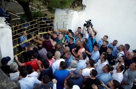 Opposition supporters demonstrate during an anti-government protest in Kavaja