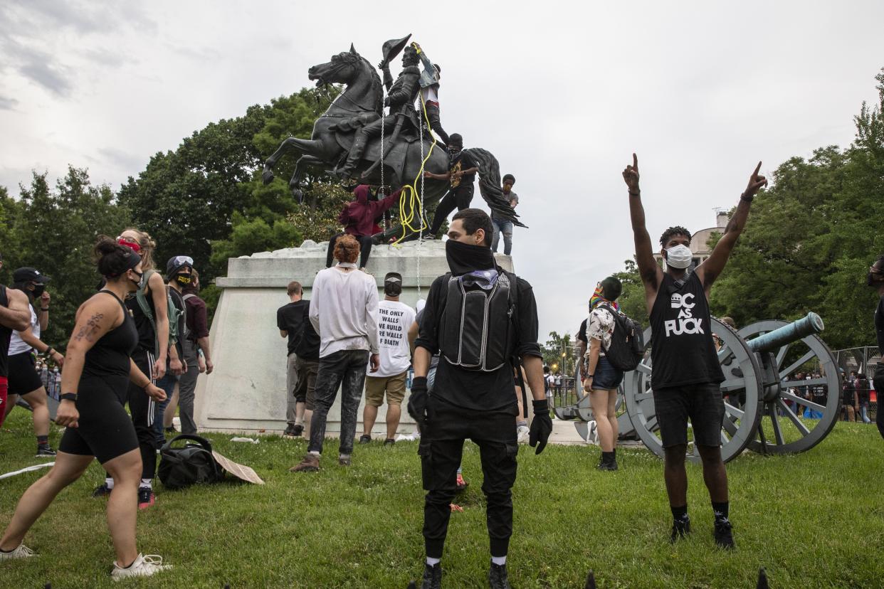 Protestors attempt to pull down the statue of Andrew Jackson in Lafayette Square near the White House on June 22, 2020, in Washington, D.C.