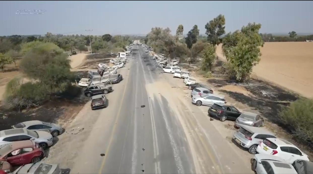 Dozens of scorched, burned cars and skid marks at the site of the Tribe of Nova trance music festival, near the Gaza Strip, Israel, shared by The Washington Post on October 9, 2023.