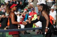 Mar 21, 2018; Key Biscayne, FL, USA; Naomi Osaka of Japan (L) shakes hands with Serena Williams of the United States (R) after their match on day two of the Miami Open at Tennis Center at Crandon Park. Osaka won 6-3, 6-2. Mandatory Credit: Geoff Burke-USA TODAY Sports