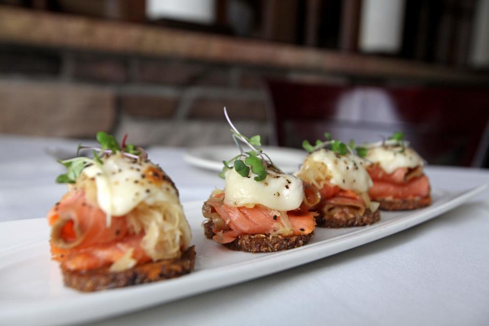 Catsmo-peppered salmon mini reubens on black bread at Limoncello in Goshen, NY, on Feb. 12, 2015.