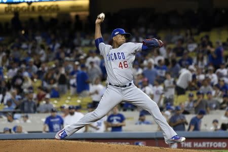 Oct 20, 2016; Los Angeles, CA, USA; Chicago Cubs relief pitcher Pedro Strop (46) delivers a pitch in the eighth inning against the Los Angeles Dodgers in game five of the 2016 NLCS playoff baseball series against the Los Angeles Dodgers at Dodger Stadium. Mandatory Credit: Richard Mackson-USA TODAY Sports