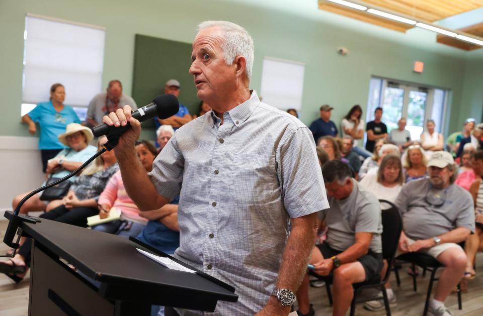 Jim Moir, of Rocky Point, speaks during a town hall meeting with Martin County Commissioner Sarah Heard on Tuesday, Oct. 3, 2023, at the Port Salerno Civic Center, 4950 S.E. Anchor Ave. "You're going after the wrong person, this person (Sarah Heard) has stood up for your rights, the land's rights and neighborhood rights more than any other commissioner in the last 20 years," said Moir. "You're in the wrong camp if you're going against her." The meeting was held to discuss parking proposals and development. Many in attendance were part of the Save Our Salerno (S.O.S.) nonprofit and are opposed to real estate investor J. Corey Crowley's vision for Port Salerno.