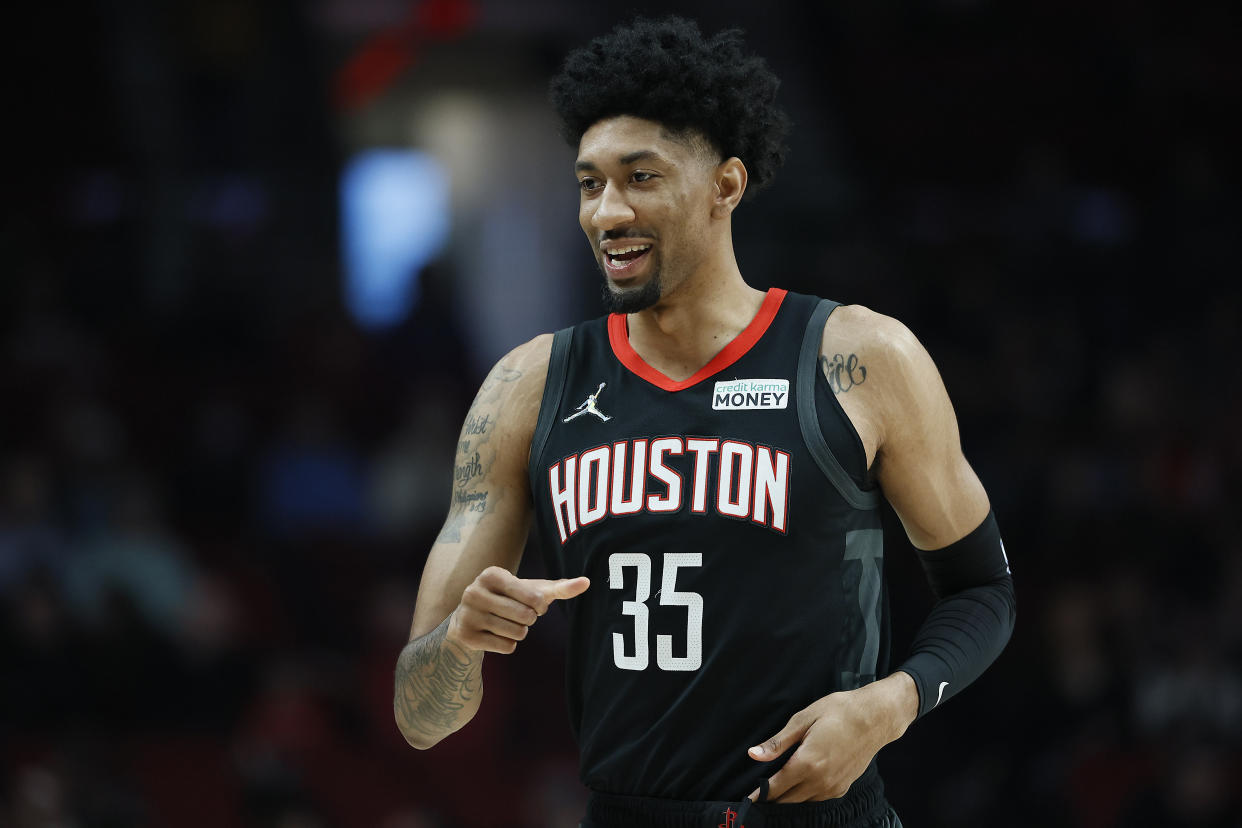 PORTLAND, OREGON - MARCH 25: Christian Wood # 35 of the Houston Rockets reacts during the first half against the Portland Trail Blazers at Moda Center on March 25, 2022 in Portland, Oregon. NOTE TO USER: User expressly acknowledges and agrees that, by downloading and or using this photograph, User is consenting to the terms and conditions of the Getty Images License Agreement. (Photo by Soobum Im/Getty Images)