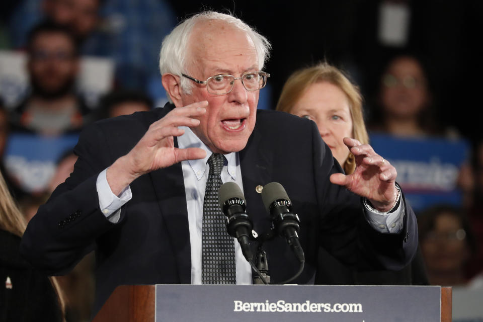 Democratic presidential candidate Sen. Bernie Sanders, I-Vt., with his wife Jane O'Meara Sanders, speaks to supporters at a caucus night campaign rally in Des Moines, Iowa, Monday, Feb. 3, 2020. (AP Photo/Pablo Martinez Monsivais)