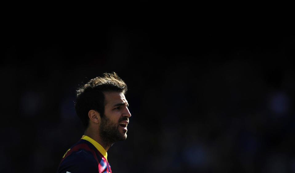 FC Barcelona's Cesc Fabregas looks on during a Spanish La Liga soccer match against Getafe at the Camp Nou stadium in Barcelona, Spain, Saturday May 3, 2014. (AP Photo/Manu Fernandez)