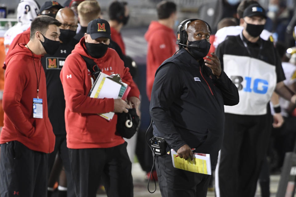 FILE - In this Nov. 7, 2020, file photo, Maryland head coach Mike Locksley looks up from the sideline during the fourth quarter of an NCAA college football game against Penn State in State College, Pa. Locksley remains on lockdown, battling the coronavirus while the Terrapins prepare for their first game in three weeks without nearly two dozen players who tested positive for COVID-19. (AP Photo/Barry Reeger, File