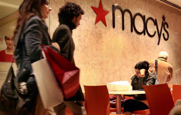 2009 Customers leave a Macy's store along the Magnificent Mile on February 2, 2009 in Chicago, Illinois.  (Photo by Scott Olson/Getty Images)