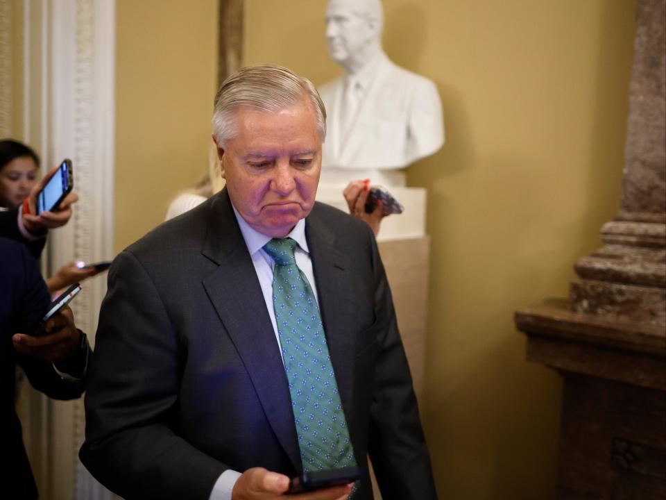 Sen. Lindsey Graham (R-SC) talks with reporters in between votes at the US Capitol (Getty Images)