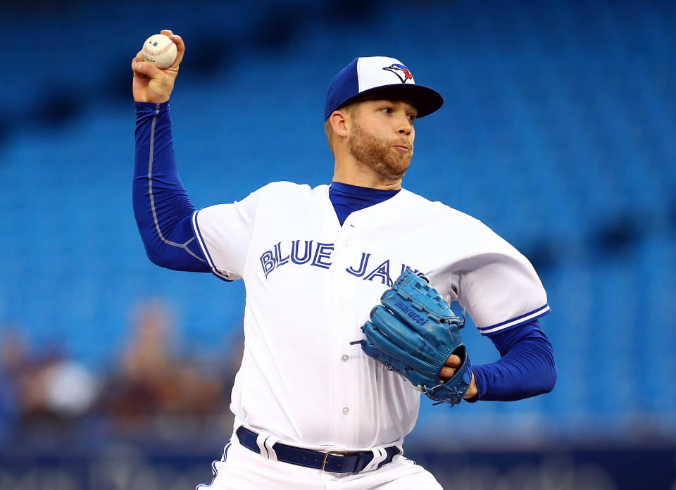 TORONTO, ON - SEPTEMBER 10:  T.J. Zeuch #71 of the Toronto Blue Jays delivers a pitch in the first inning during a MLB game against the Boston Red Sox at Rogers Centre on September 10, 2019 in Toronto, Canada.  (Photo by Vaughn Ridley/Getty Images)