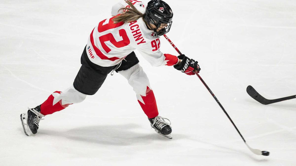 Canada beats USA in overtime to win women's hockey world title