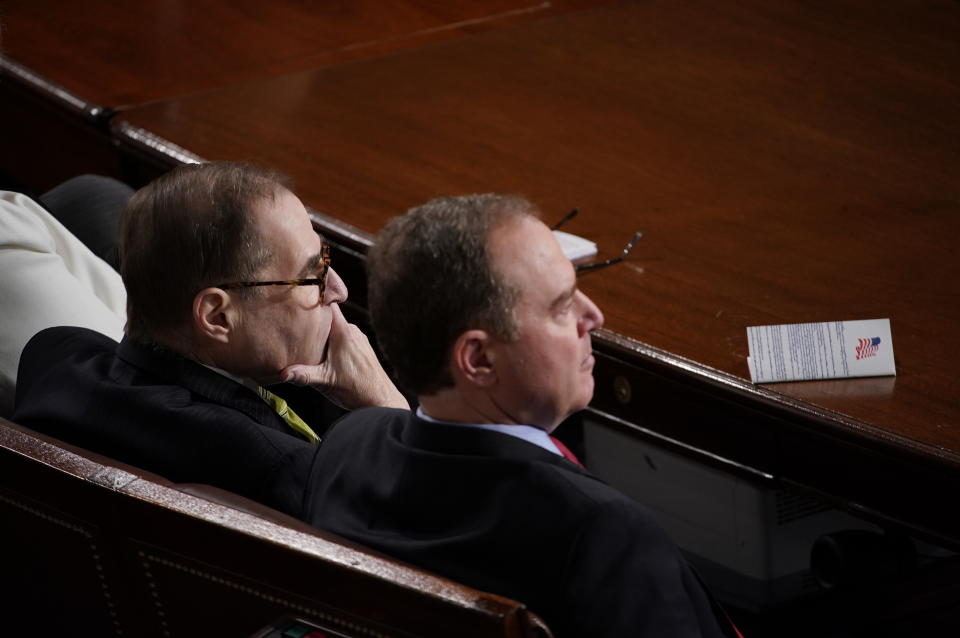 Representative Adam Schiff, a Democrat from California, right, and Representative Jerrold Nadler, a Democrat from New York, listen as U.S. President Donald Trump, not pictured, delivers a State of the Union address to a joint session of Congress at the U.S. Capitol in Washington, D.C., U.S., on Tuesday, Feb. 4, 2020. (Al Drago/Bloomberg via Getty Images)