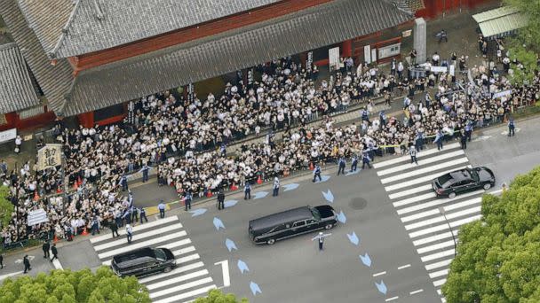 PHOTO: An aerial view shows motorcade carrying the body of the late former Japanese Prime Minister Shinzo Abe, leave after his funeral at Zojoji Temple in Tokyo, Japan, on July 12, 2022. (Kyodo via Reuters)