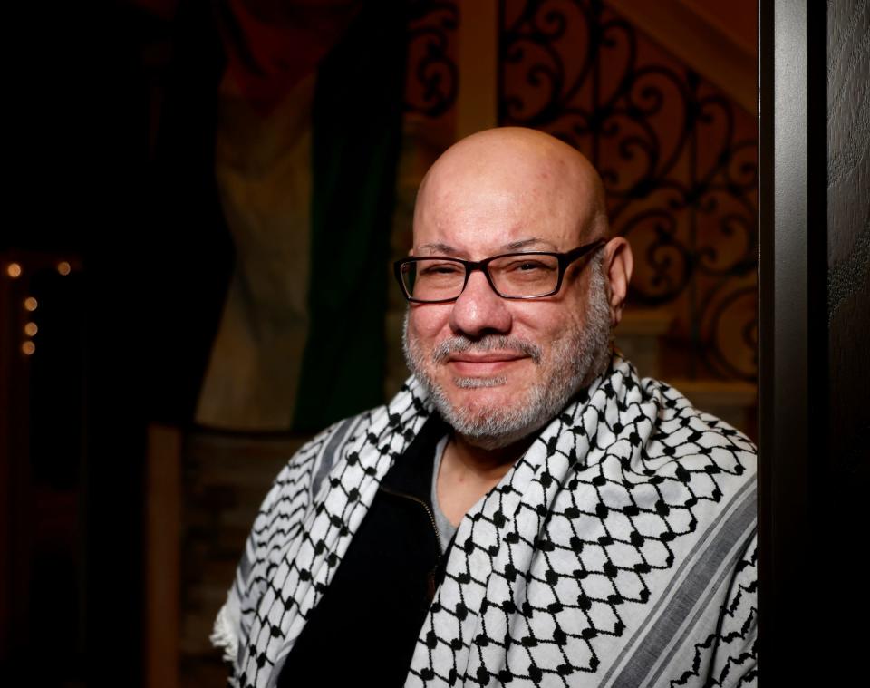 Mohammad Enayah poses in his West Bloomfield, Michigan home. Enayah is a supporter of the Abandon Biden campaign and had multiple members of his family killed by the Israeli strikes in Gaza in the fall of 2023.