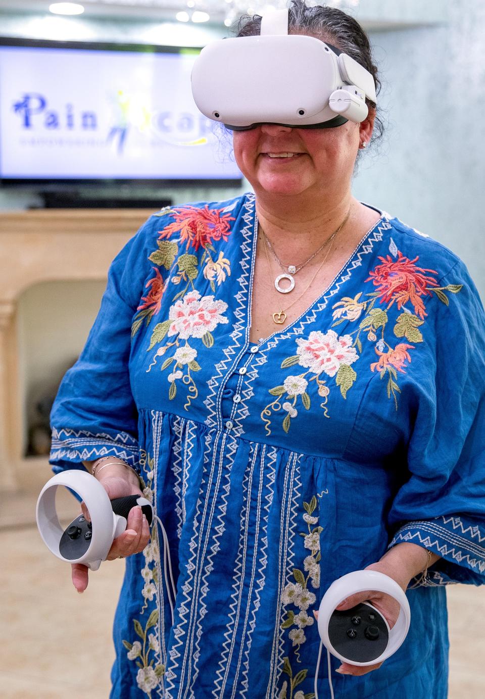 Kathy Hoy starts her pain management session using virtual reality at Donya Spa in Rancho Mirage, Calif., on September 8, 2023.