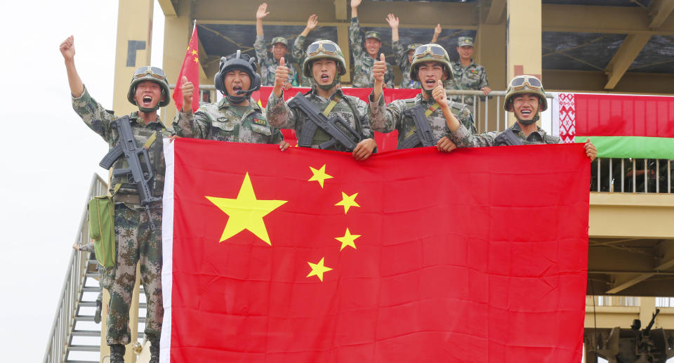 Chinese troops with a flag