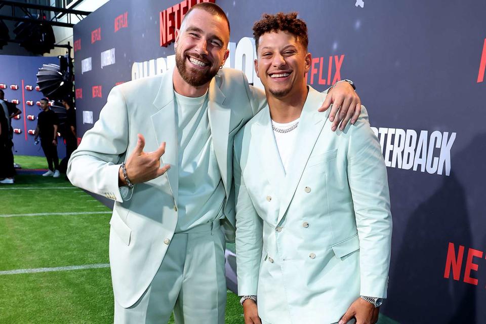<p>Randy Shropshire/Getty Images</p> Travis Kelce and Patrick Mahomes attend the Netflix Premiere of "Quarterback" 