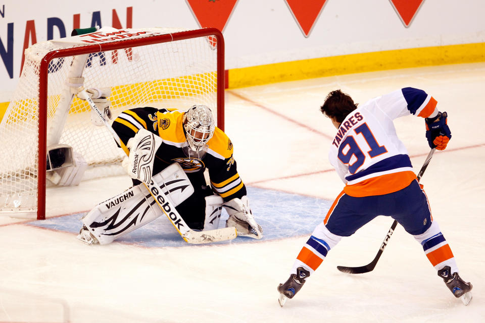 OTTAWA, ON - JANUARY 28: John Tavares #91 of the New York Islanders and Team Alfredsson takes a shot against Tim Thomas #30 of the Boston Bruins and Team Chara during Tim Hortons NHL Elimination Shoot Out of the 2012 Molson Canadian NHL All-Star Skills Competition at Scotiabank Place on January 28, 2012 in Ottawa, Ontario, Canada. (Photo by Gregory Shamus/Getty Images)