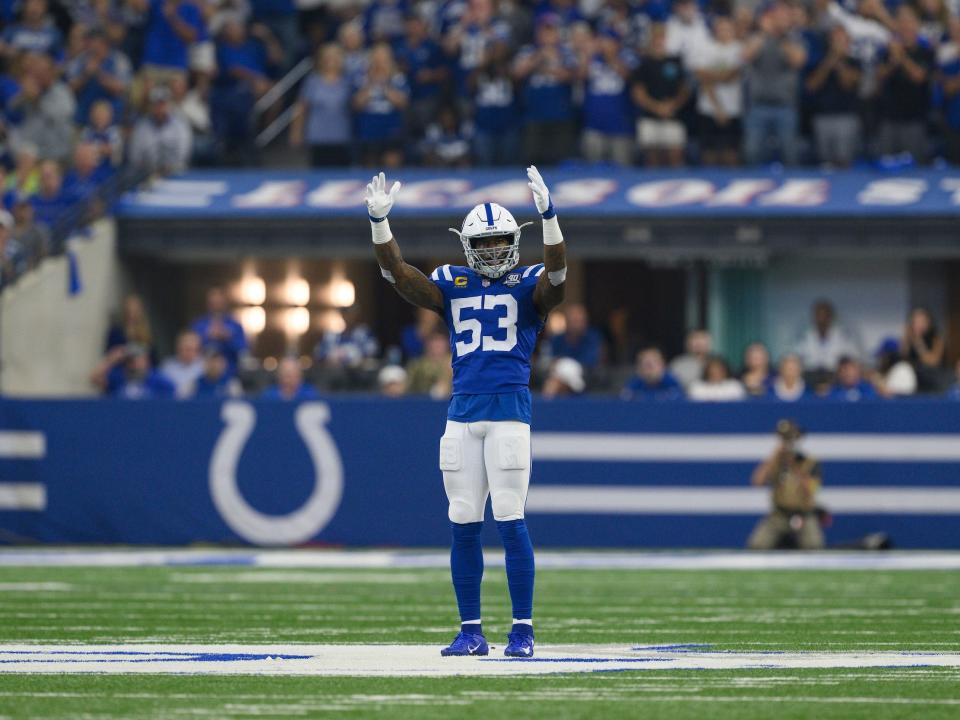 Shaq Leonard gestures to the Indianapolis Colts' home crowd at Lucas Oil Stadium.